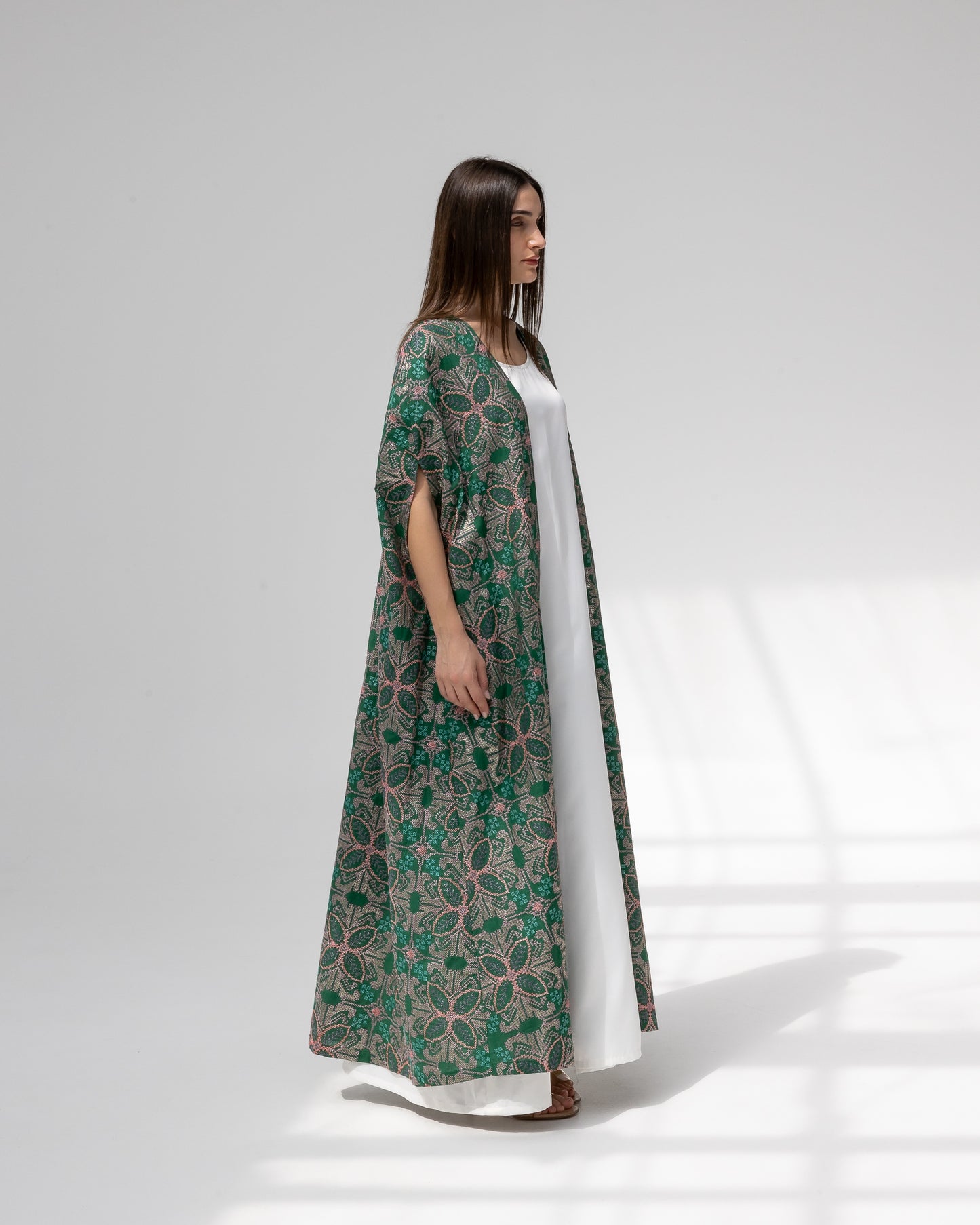 Emerald green kaftan with embroidery