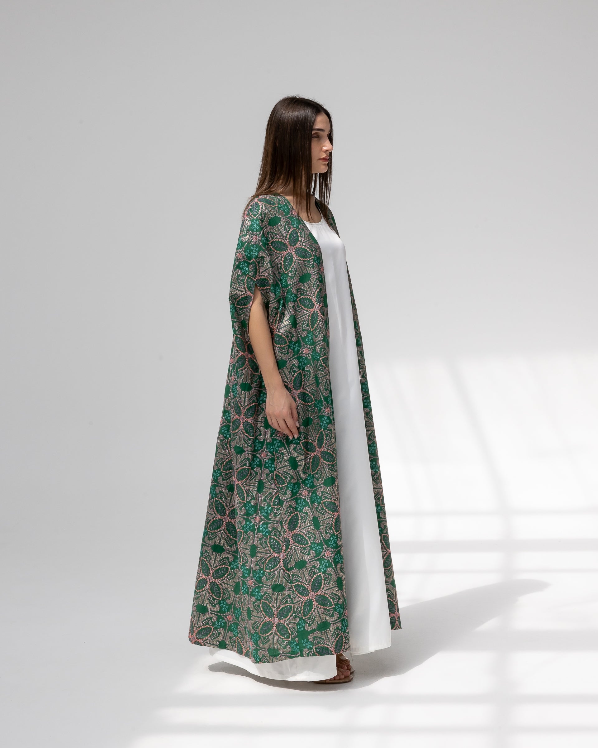 Emerald green kaftan with embroidery